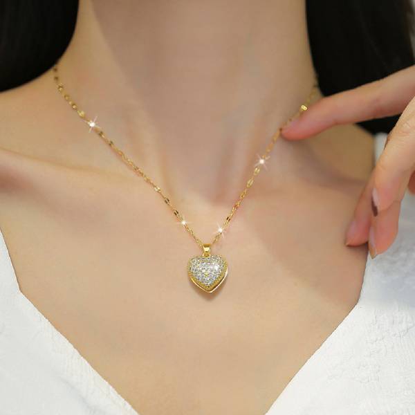 Heart pendant with pearl inside
